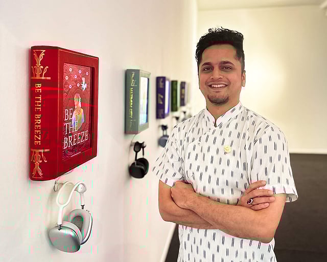 <strong>Gaurav Ogale with his artwork <em>Best-sellers</em></strong>