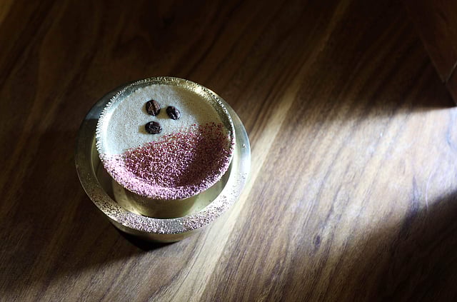 <em>Irish coffee in a davara, topped with rose petal dust</em>