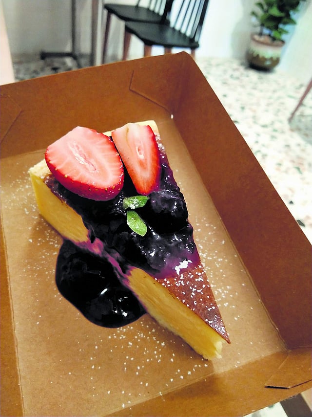 <em>Eggless cheesecake topped with a blueberry compote </em>