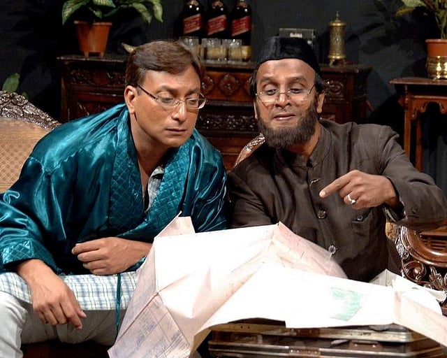 <strong><em>A scene from the play</em></strong>