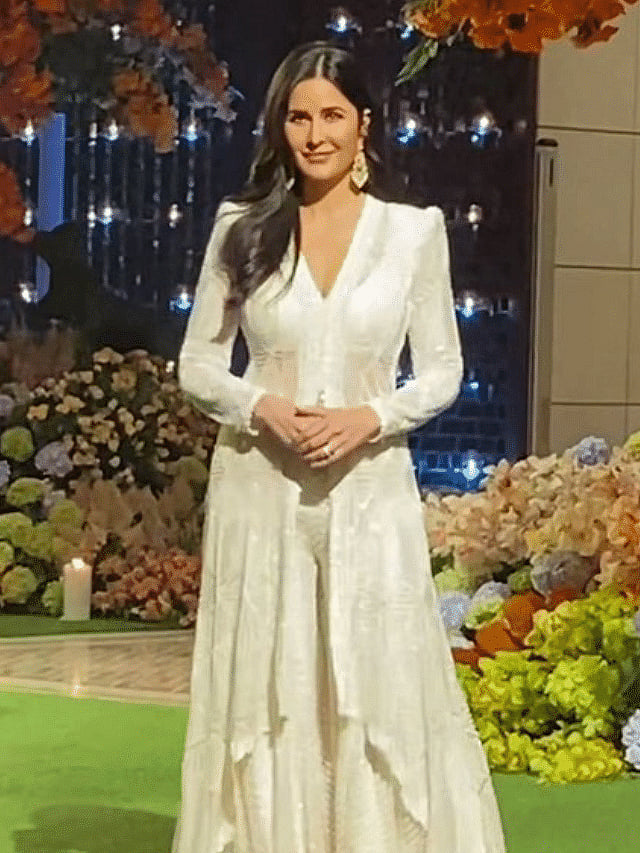 sachin and babi light blue dress The Story Behind Katrina Kaif's Wedding Wardrobe main image 1
